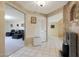 Elegant entryway with tile floors, a water fountain, and views to living room at 9719 W Pineridge Dr, Sun City, AZ 85351