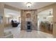 Entryway with tile flooring, views into living and dining rooms at 9719 W Pineridge Dr, Sun City, AZ 85351