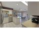 Kitchen with white cabinets and stainless steel appliances at 9719 W Pineridge Dr, Sun City, AZ 85351