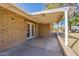 Covered patio area with double doors leading inside at 1019 E Belmont Ave, Phoenix, AZ 85020