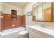 Bathroom with tub, toilet and vanity at 1019 E Belmont Ave, Phoenix, AZ 85020