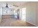 Bedroom with ceiling fan, carpet, and window at 1019 E Belmont Ave, Phoenix, AZ 85020