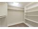 Walk-in closet with shelves and hanging rod at 1019 E Belmont Ave, Phoenix, AZ 85020