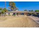 House with a large yard and carport at 1019 E Belmont Ave, Phoenix, AZ 85020