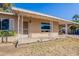 Covered porch with metal railing and entrance at 1019 E Belmont Ave, Phoenix, AZ 85020