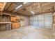 Garage workshop with built-in cabinets and shelving at 1019 E Belmont Ave, Phoenix, AZ 85020