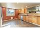 Kitchen boasts wood cabinets, granite counters at 1019 E Belmont Ave, Phoenix, AZ 85020