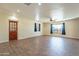 Spacious living room with wood-look tile floors at 1019 E Belmont Ave, Phoenix, AZ 85020