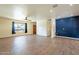 Living room features wood-look tile floors at 1019 E Belmont Ave, Phoenix, AZ 85020