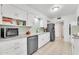 Updated kitchen featuring granite counters and stainless steel appliances at 10314 W Sun City Blvd, Sun City, AZ 85351