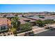 Aerial view of house with landscaping, driveway and neighborhood view at 10315 E Palladium Dr, Mesa, AZ 85212