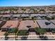 Aerial view of a residential neighborhood with numerous homes and landscaping at 10315 E Palladium Dr, Mesa, AZ 85212