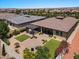 Aerial view of the house featuring a large backyard and a pergola at 10315 E Palladium Dr, Mesa, AZ 85212