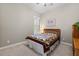 Cozy bedroom with window and wood dresser at 10315 E Palladium Dr, Mesa, AZ 85212