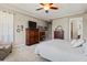 Main bedroom with large closet, ceiling fan, and plenty of natural light at 10315 E Palladium Dr, Mesa, AZ 85212