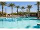 Community pool with basketball hoops and lounge chairs at 10315 E Palladium Dr, Mesa, AZ 85212