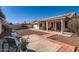 Backyard patio with seating area and gravel at 11019 W Ventana W Dr, Sun City, AZ 85373