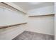 Large walk-in closet with ample shelving at 11019 W Ventana W Dr, Sun City, AZ 85373