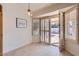 Casual dining area with patio access and plantation shutters at 11019 W Ventana W Dr, Sun City, AZ 85373