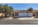 Single-story home with two-car garage and desert landscaping at 11019 W Ventana W Dr, Sun City, AZ 85373