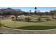 Enjoy a round of putting on this beautifully landscaped putting green at 11019 W Ventana W Dr, Sun City, AZ 85373