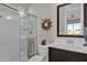 Bathroom with walk-in shower, vanity, and modern decor at 1115 E Gleneagle St, Chandler, AZ 85249