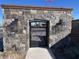 Elegant community entrance with stonework and iron gate at 1115 E Gleneagle St, Chandler, AZ 85249