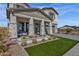 Two-story house with front porch, landscaping, and driveway at 1115 E Gleneagle St, Chandler, AZ 85249