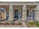 Front porch with brick columns and wicker chairs at 1115 E Gleneagle St, Chandler, AZ 85249