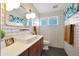 Clean bathroom with white subway tile, a modern vanity, and hexagon floor tile at 1125 E Northview Ave, Phoenix, AZ 85020