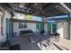 Covered patio with comfortable seating and outdoor lighting at 1125 E Northview Ave, Phoenix, AZ 85020