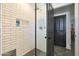 Modern shower with subway tile, hexagon tile floor, and a built-in niche at 1125 E Northview Ave, Phoenix, AZ 85020