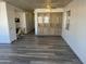 Living room with grey flooring and access to kitchen at 11411 N 91St Ave # 221, Peoria, AZ 85345