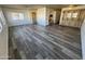 Open living area with grey flooring and built-in hutch at 11411 N 91St Ave # 221, Peoria, AZ 85345