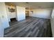 Bright living room featuring grey vinyl flooring at 11411 N 91St Ave # 221, Peoria, AZ 85345