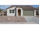 Charming single-story home with a neutral-colored stucco exterior, a tiled roof, and a one-car garage at 12766 W Parkway Ln, Avondale, AZ 85323