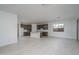 Open floor plan featuring a modern kitchen, and a bright and airy living space at 12766 W Parkway Ln, Avondale, AZ 85323