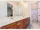 Double vanity bathroom with access to shower and bedroom at 1301 E Ibis St, Gilbert, AZ 85297