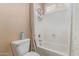 Clean bathroom with a bathtub, toilet and shower at 1301 E Ibis St, Gilbert, AZ 85297