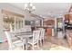 Bright dining area with a view to the backyard and kitchen at 1301 E Ibis St, Gilbert, AZ 85297