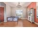 Formal dining room with hardwood floors and a large window at 1301 E Ibis St, Gilbert, AZ 85297