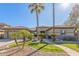 Single-story home with stone accents and a landscaped front yard at 1301 E Ibis St, Gilbert, AZ 85297