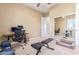 Home office with desk, chair, and mirrored closet at 1301 E Ibis St, Gilbert, AZ 85297