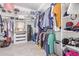 Large walk-in closet with ample shelving and hanging space at 1301 E Ibis St, Gilbert, AZ 85297