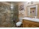 Clean bathroom with a large walk-in shower and updated vanity at 13606 N 108Th Dr, Sun City, AZ 85351