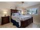 Comfortable bedroom with a king-size bed and updated nightstands at 13606 N 108Th Dr, Sun City, AZ 85351