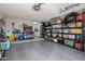 Garage with ample storage shelving and space for a bicycle at 13606 N 108Th Dr, Sun City, AZ 85351