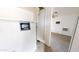 Laundry area with hookups and additional storage at 143 N 88Th Pl, Mesa, AZ 85207