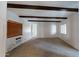 Carpeted living room with wood beams and window coverings at 143 N 88Th Pl, Mesa, AZ 85207