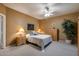 Bright bedroom with a double bed and wood dresser at 15050 N Thompson Peak Pkwy # 1059, Scottsdale, AZ 85260